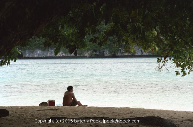 Sitting on the beach in the Rock Islands, Palau