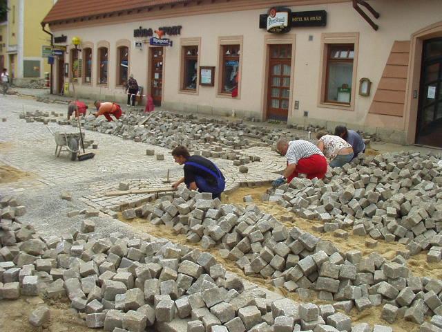 Laying a new street, stone by stone, in Telc