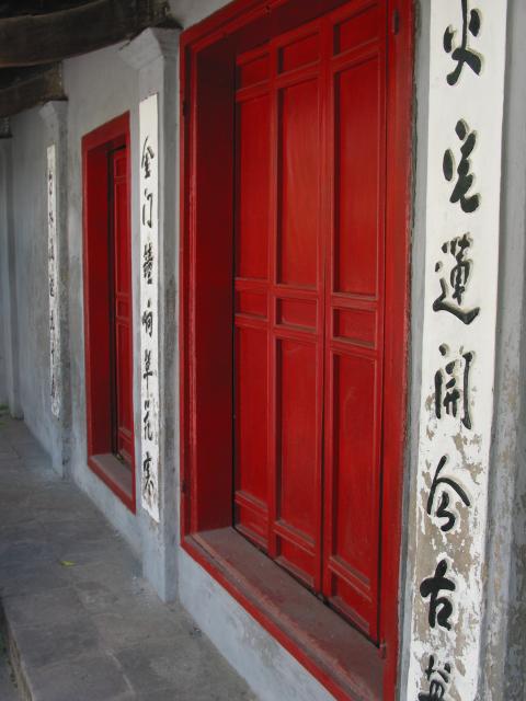 Closed doors and inscriptions on wall at Ngoc Son temple