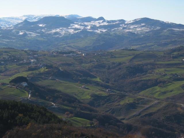 View from San Marino toward hills and snowy peaks