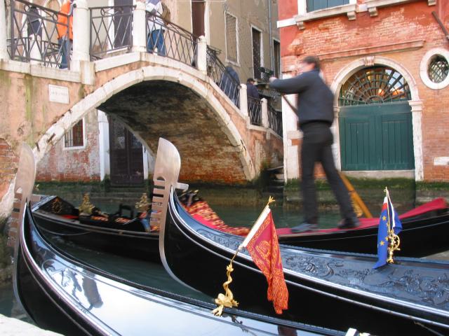 Gondolier, gondolas, bridge