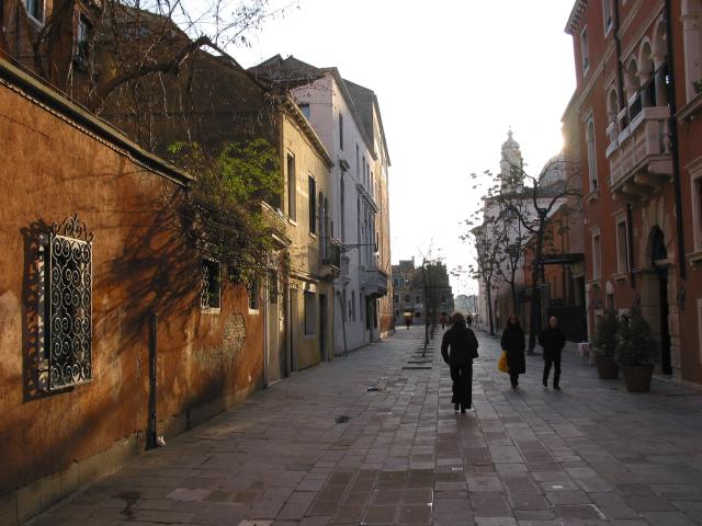 Late-afternoon view of people walking along a street, Venezia