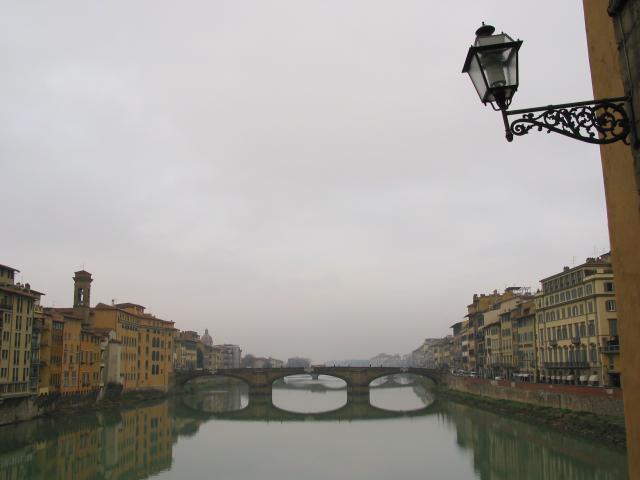 Arno River on a cloudy day (from Ponte Vecchio?), with lamp in foreground, Firenze
