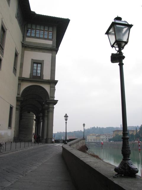 Street lamps, street and building along the Arno, Firenze