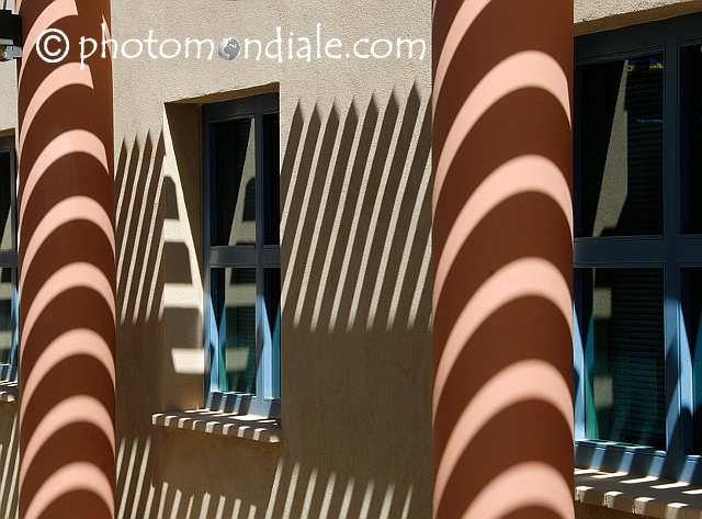 Sun and shadow on the wall of the entryway at Indian Oasis Intermediate School in Sells, AZ