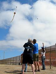 Flying kites from the US side of the border fence