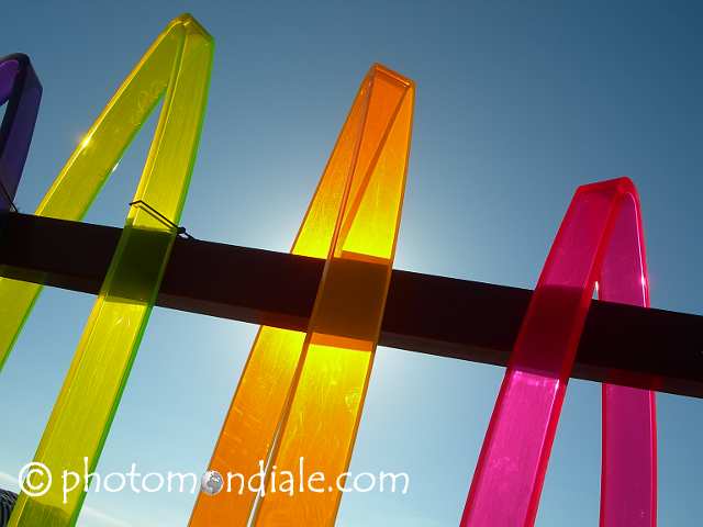 Colored plastic arches on entrance to Imperial Beach pier